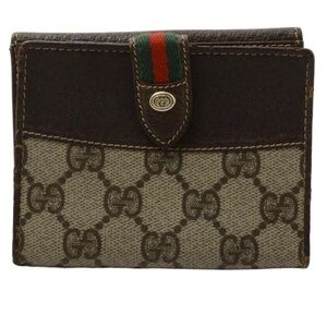 Authentic Gucci Signature Brown and Tan Wallet